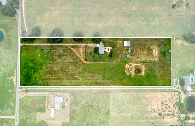 a view of an outdoor space and swimming pool