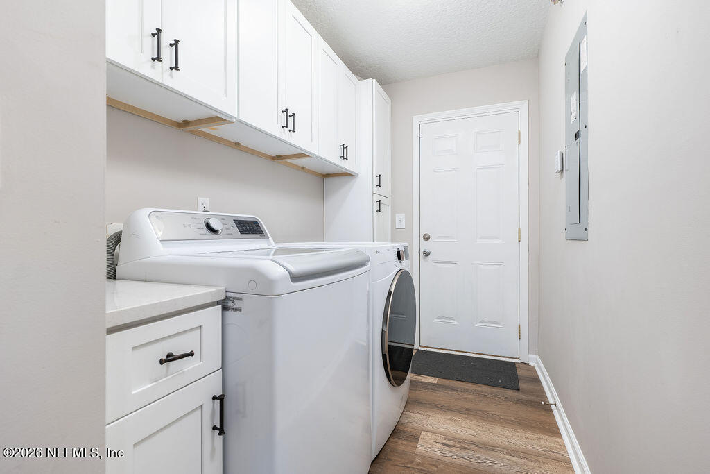 1984 Bluebonnet Way Fleming Island, FL 32003 - Photo 36 of 69 a utility room with dryer and washer