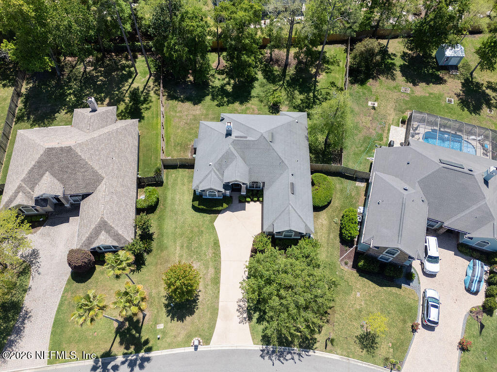 1984 Bluebonnet Way Fleming Island, FL 32003 - Photo 44 of 69 an aerial view of a house with a garden