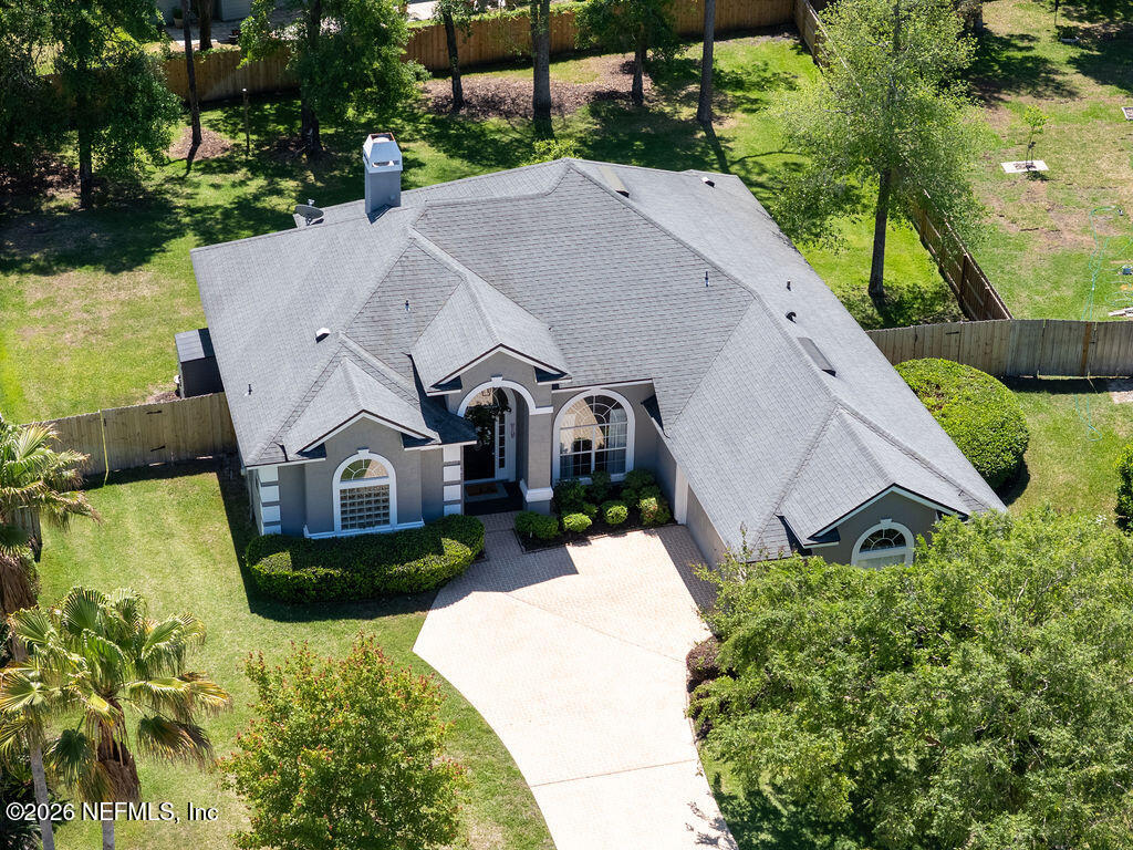 1984 Bluebonnet Way Fleming Island, FL 32003 - Photo 47 of 69 a aerial view of a house with a yard