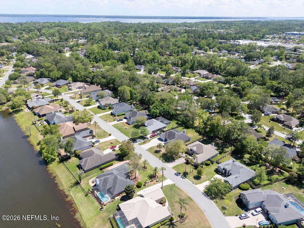 1984 Bluebonnet Way Fleming Island, FL 32003 - Photo 49 of 69 an aerial view of residential houses with outdoor space