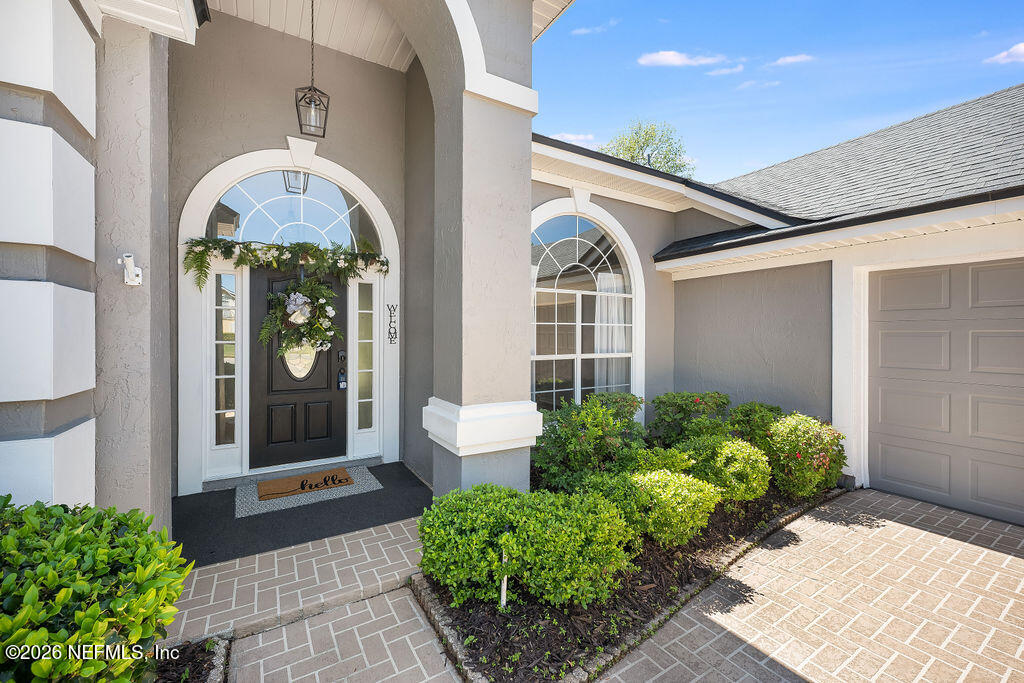 1984 Bluebonnet Way Fleming Island, FL 32003 - Photo 5 of 69 a front view of a house