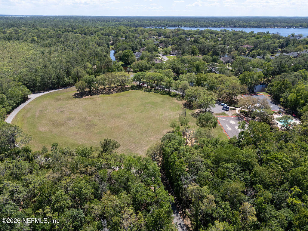 1984 Bluebonnet Way Fleming Island, FL 32003 - Photo 57 of 69 an aerial view of a houses with a yard