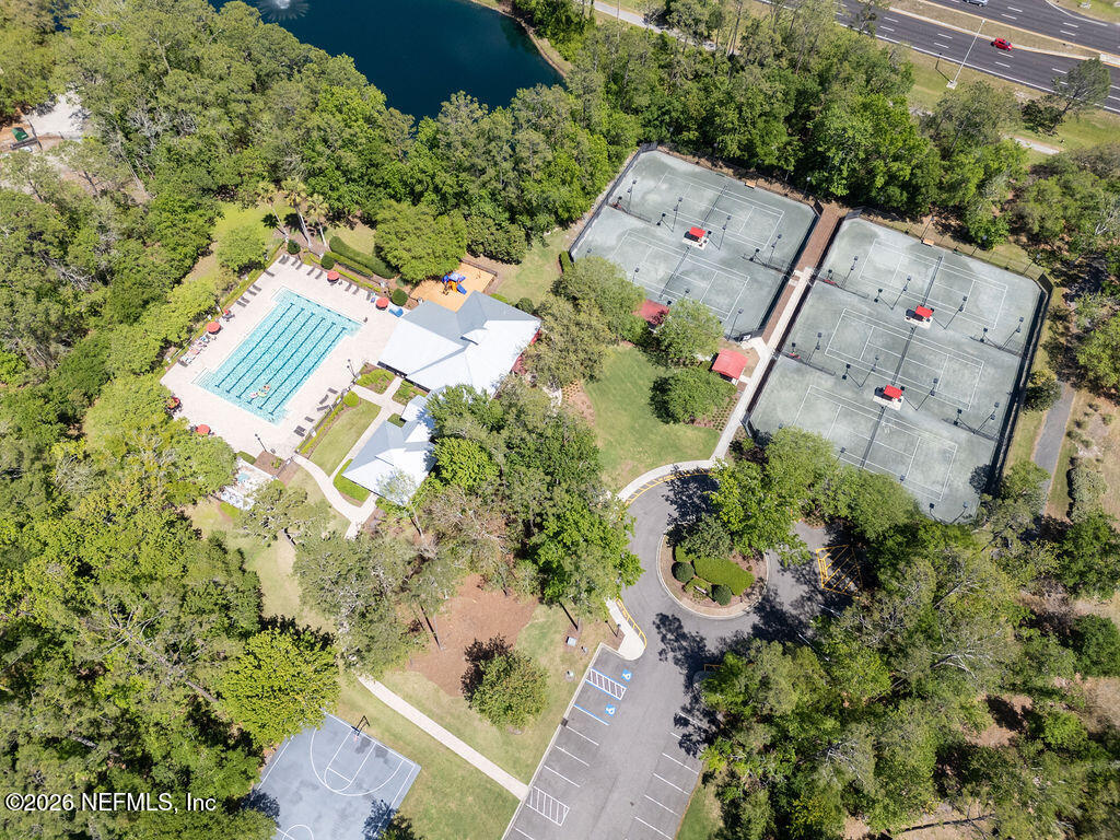 1984 Bluebonnet Way Fleming Island, FL 32003 - Photo 65 of 69 an aerial view of a house with a yard