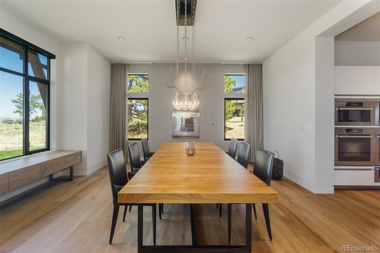 7895 Forest Keep Circle Parker, CO 80134 - Photo 14 of 40 a view of a dining room with furniture and window