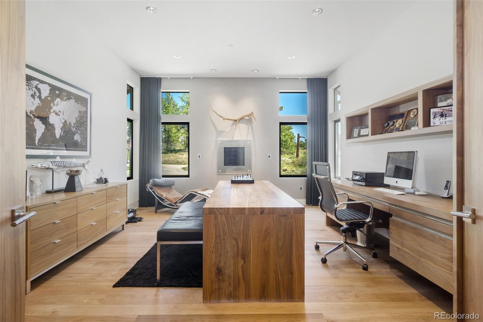 7895 Forest Keep Circle Parker, CO 80134 - Photo 23 of 40 a view of a living room filled with furniture and a window