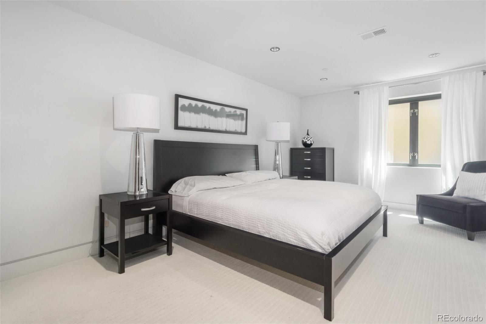 7895 Forest Keep Circle Parker, CO 80134 - Photo 29 of 40 a bedroom with a bed and window