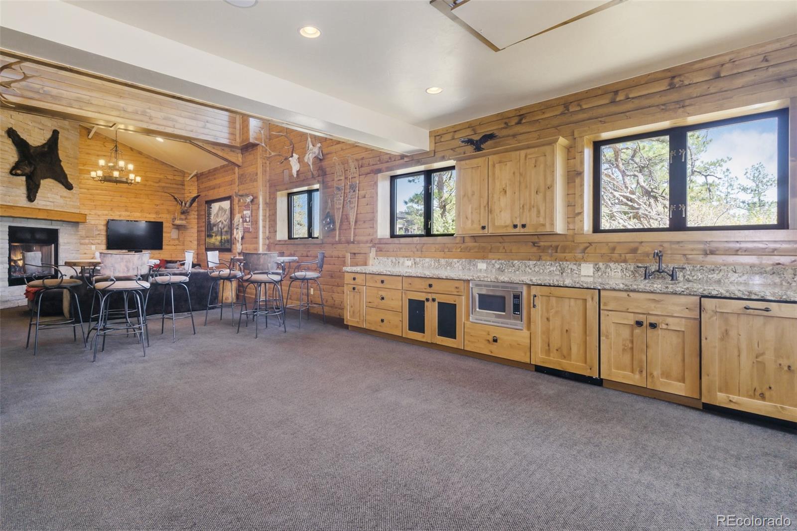 7895 Forest Keep Circle Parker, CO 80134 - Photo 35 of 40 a large kitchen with stainless steel appliances granite countertop lots of counter top space