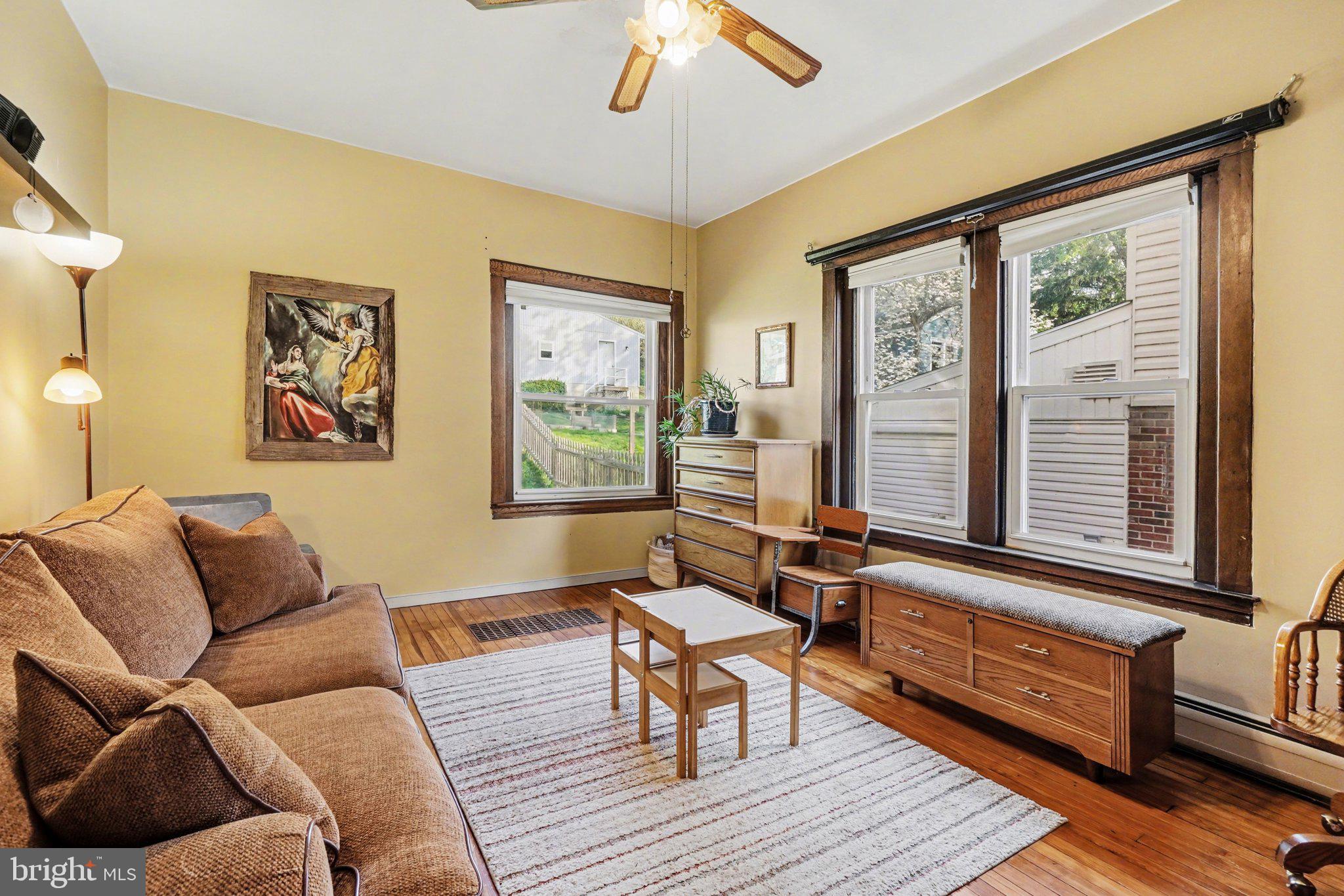 321 Walnut Street Lemoyne, PA 17043 - Photo 13 of 34 a living room with furniture and a window