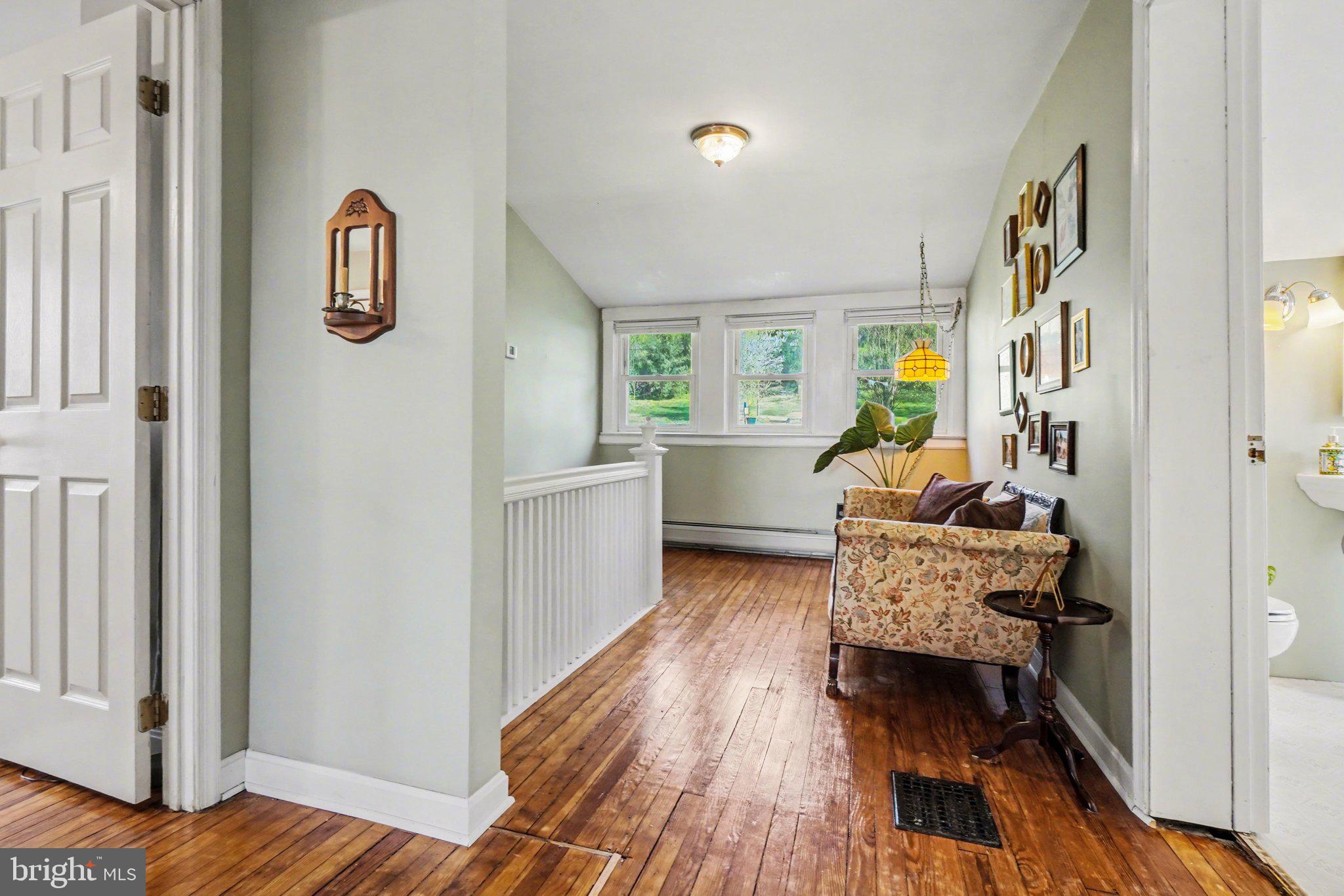 321 Walnut Street Lemoyne, PA 17043 - Photo 15 of 34 a living room with furniture and a wooden floor