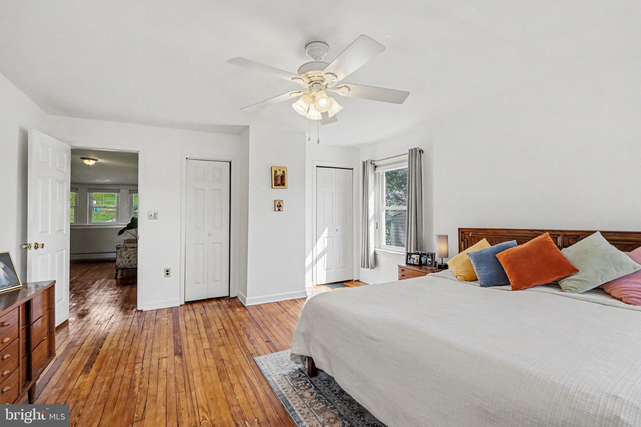 321 Walnut Street Lemoyne, PA 17043 - Photo 16 of 34 a bedroom with a bed and wooden floor