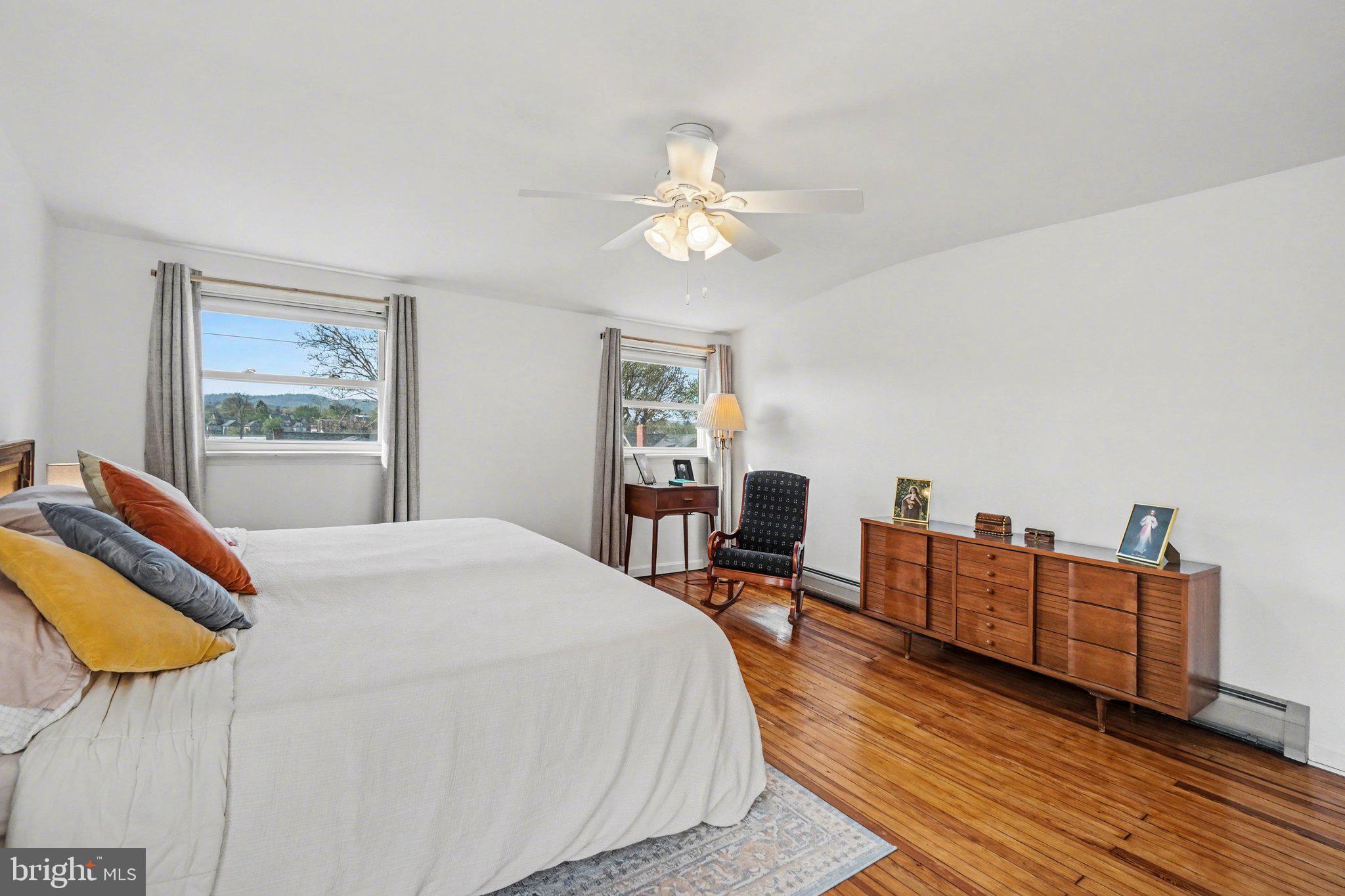 321 Walnut Street Lemoyne, PA 17043 - Photo 17 of 34 a bedroom with furniture and a wooden floor