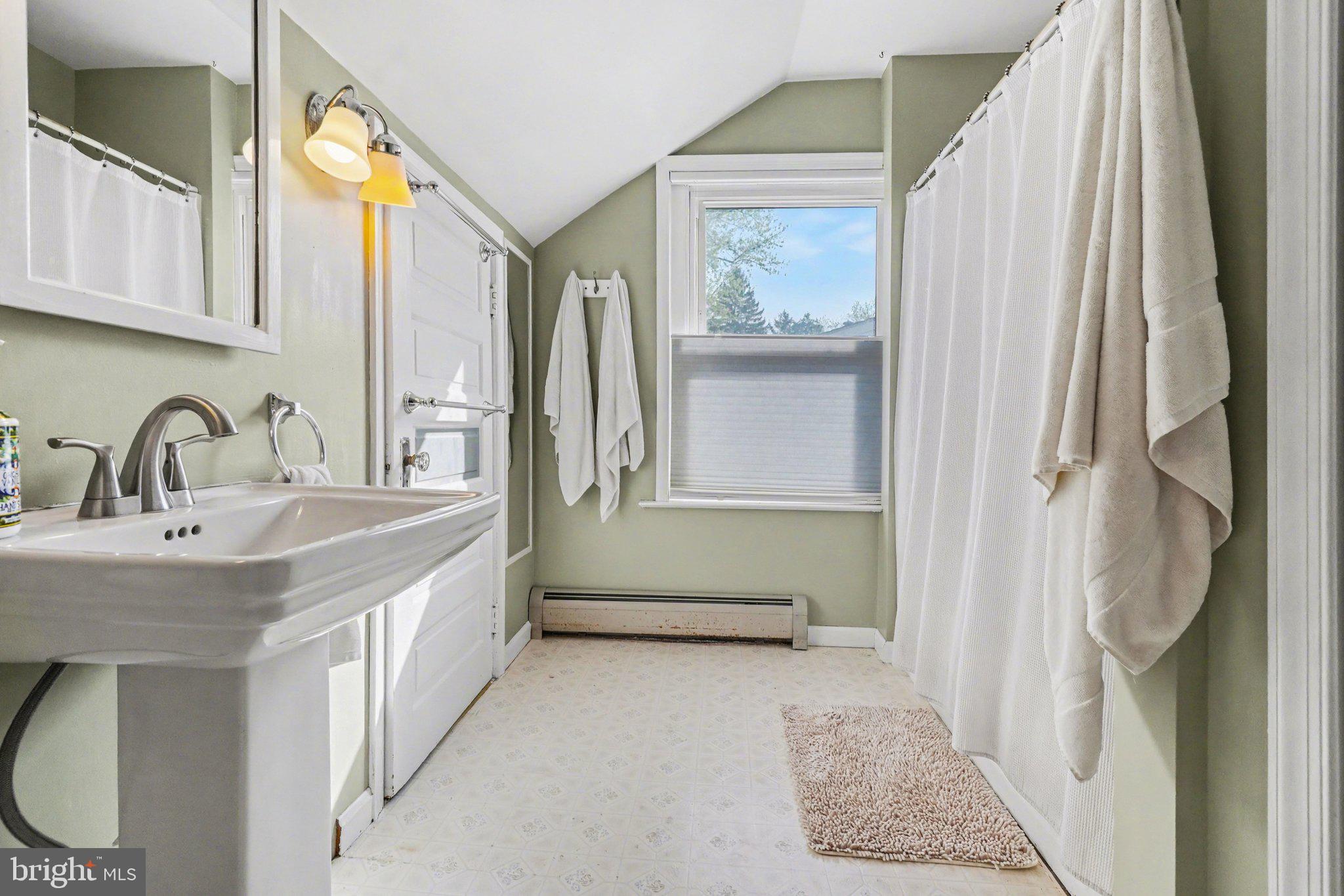 321 Walnut Street Lemoyne, PA 17043 - Photo 18 of 34 a bathroom with a sink and a mirror