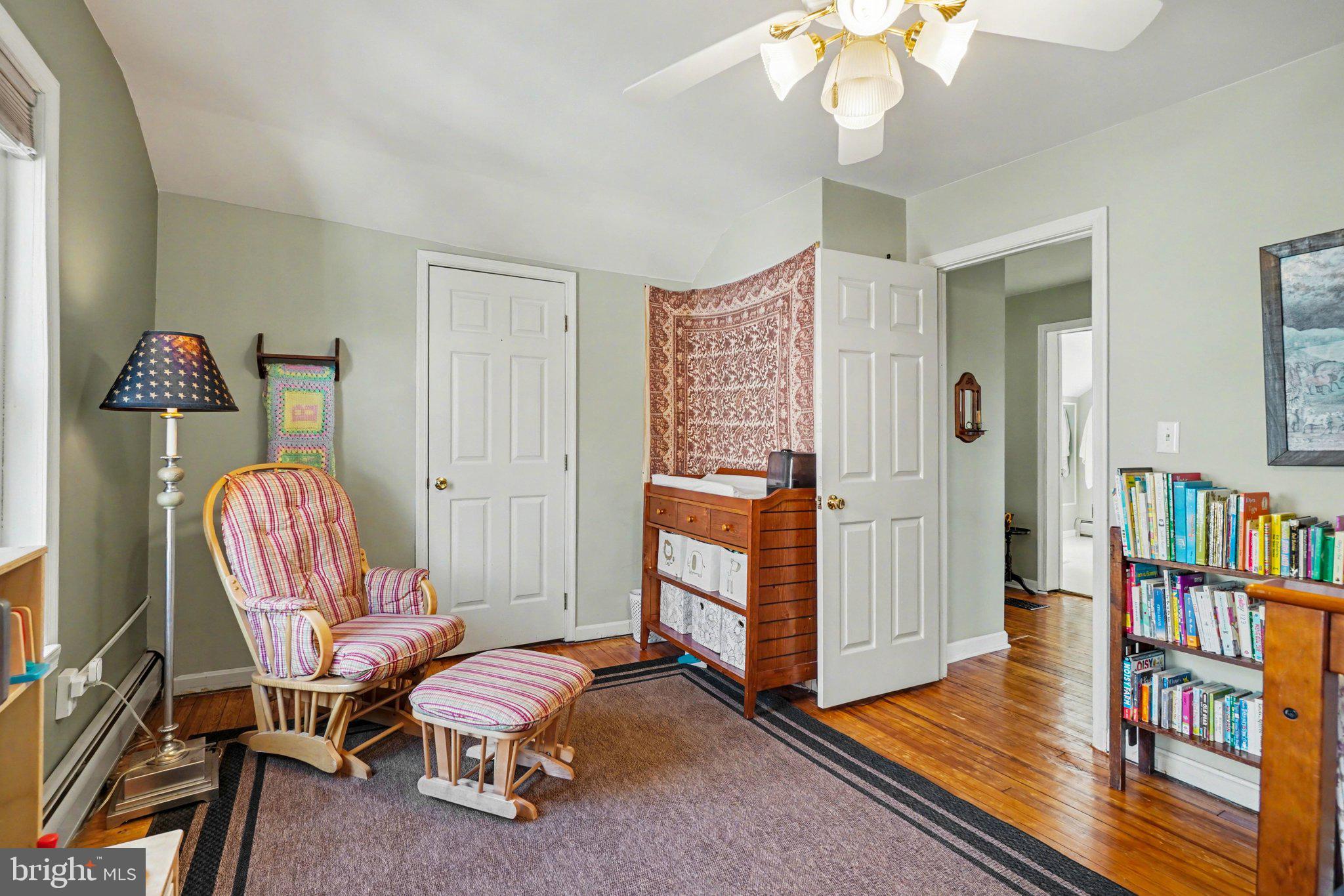321 Walnut Street Lemoyne, PA 17043 - Photo 21 of 34 a living room with furniture and a book shelf