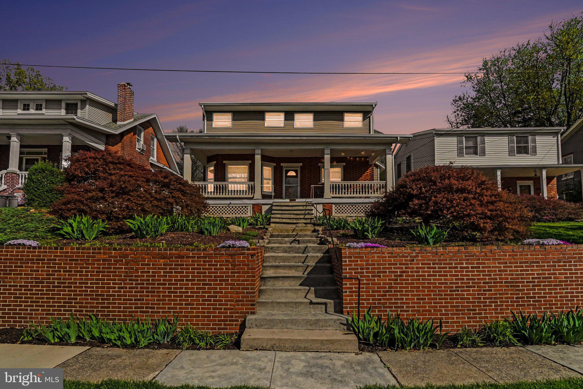 321 Walnut Street Lemoyne, PA 17043 - Photo 34 of 34 a front view of a house with a garden
