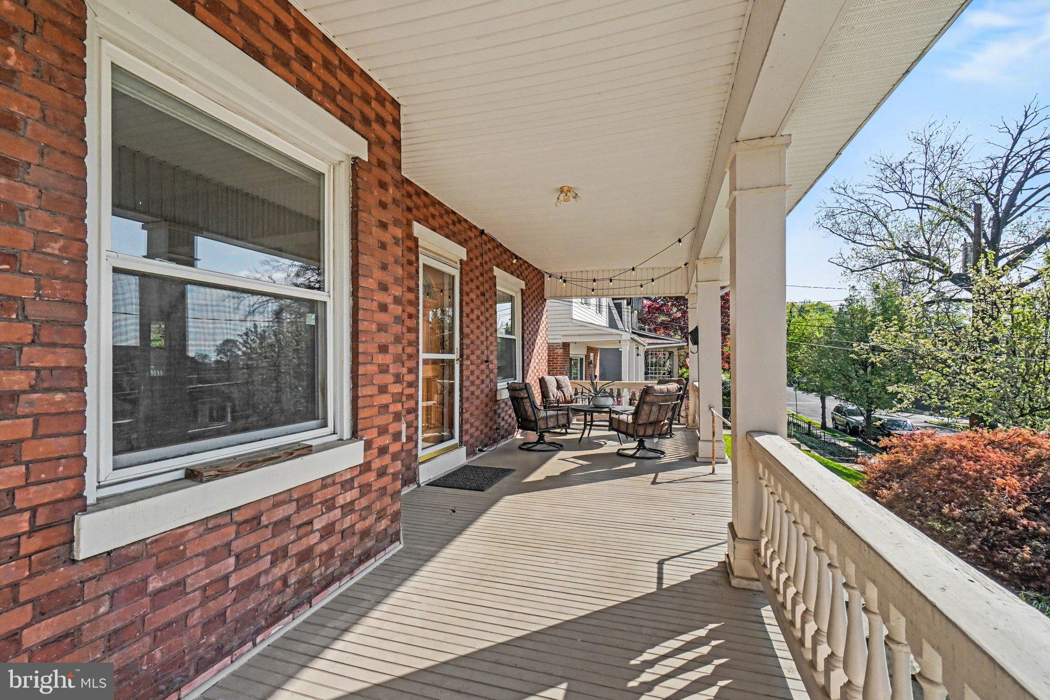 321 Walnut Street Lemoyne, PA 17043 - Photo 4 of 34 a balcony with chairs and outdoor space