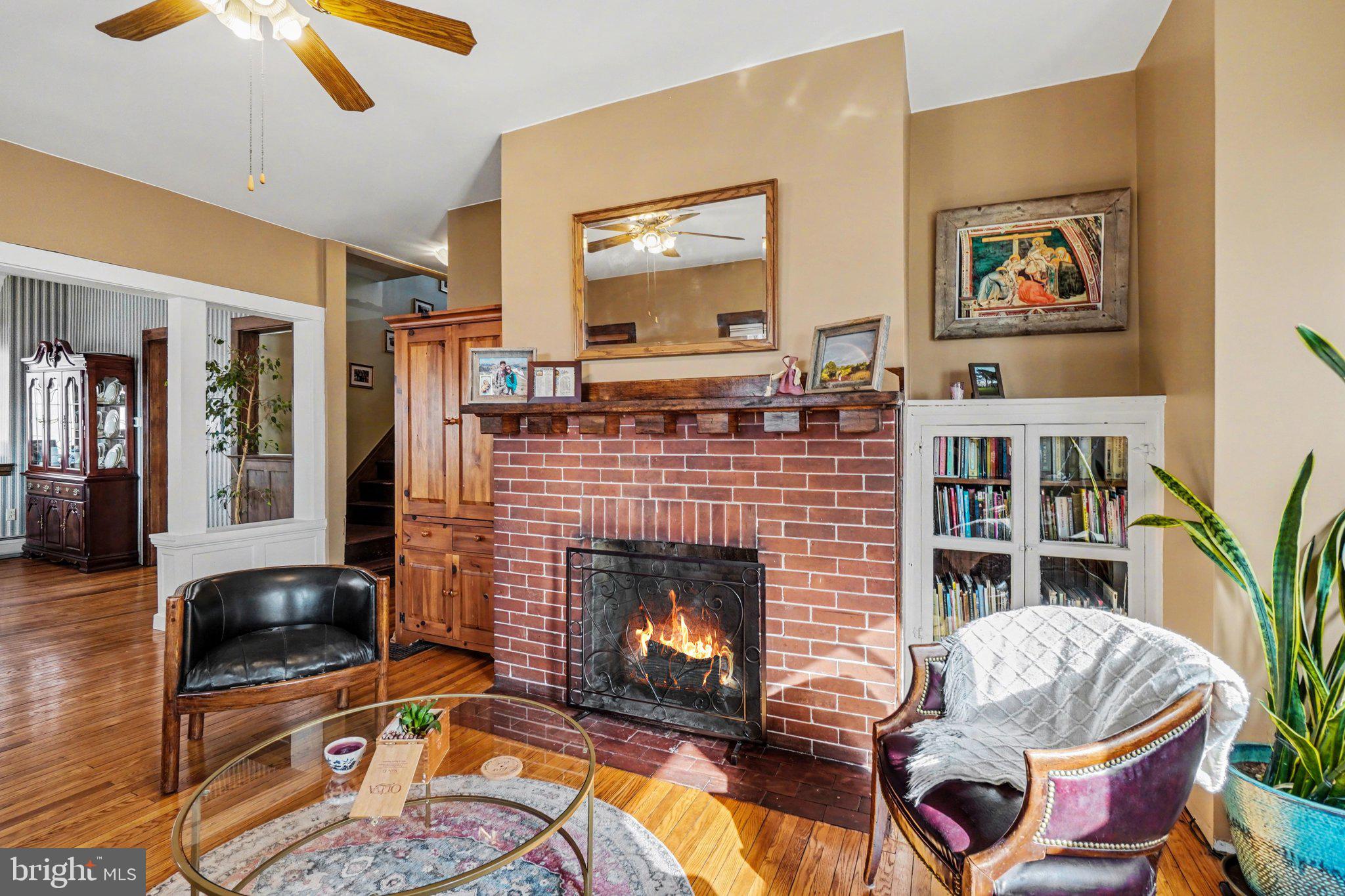 321 Walnut Street Lemoyne, PA 17043 - Photo 6 of 34 a living room with furniture and a fireplace