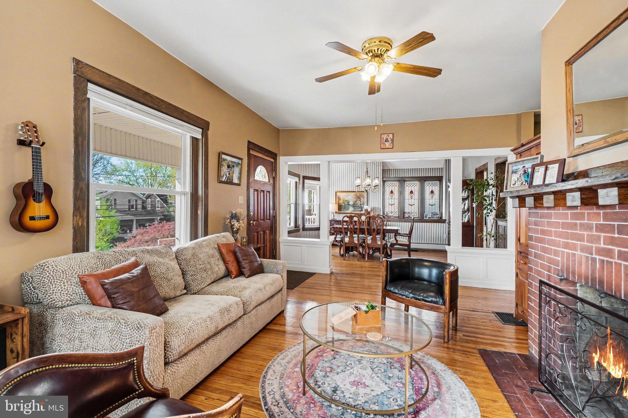 321 Walnut Street Lemoyne, PA 17043 - Photo 7 of 34 a living room with furniture and a fireplace