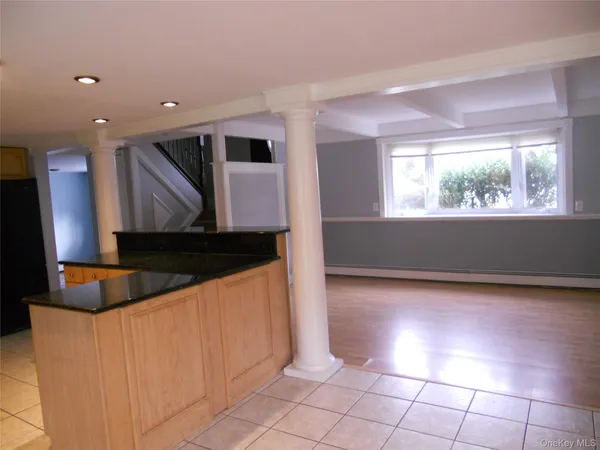 a kitchen with stainless steel appliances a sink and a microwave