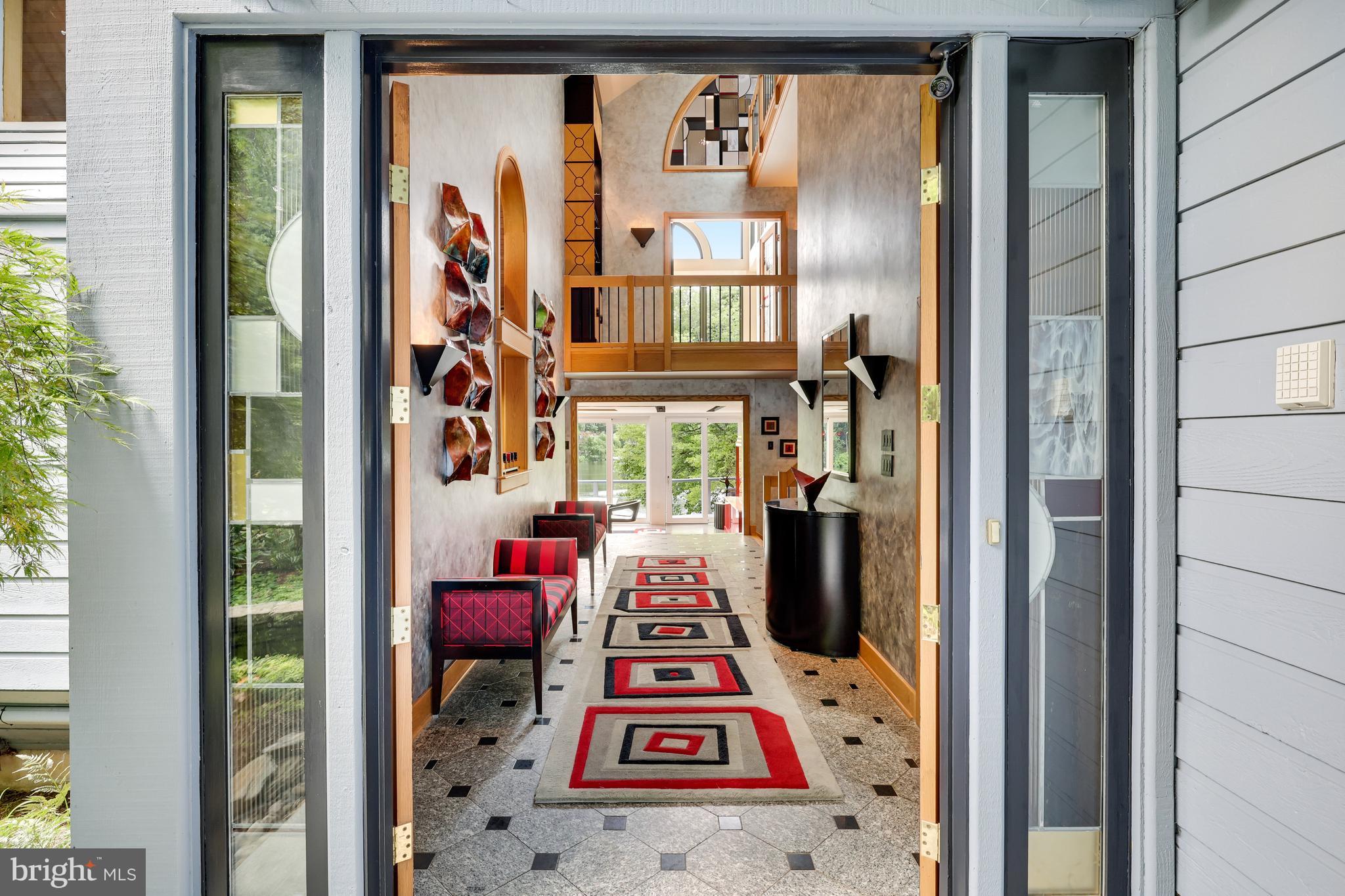 2202 Spinnaker Court Reston, VA 20191 - Photo 8 of 137 Double doors open to the main foyer.