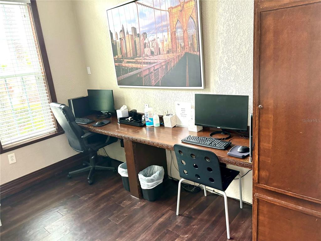 5467 Vineland Road, Unit 6308 Orlando, FL 32811 - Photo 39 of 39 a view of a workspace with furniture and a window