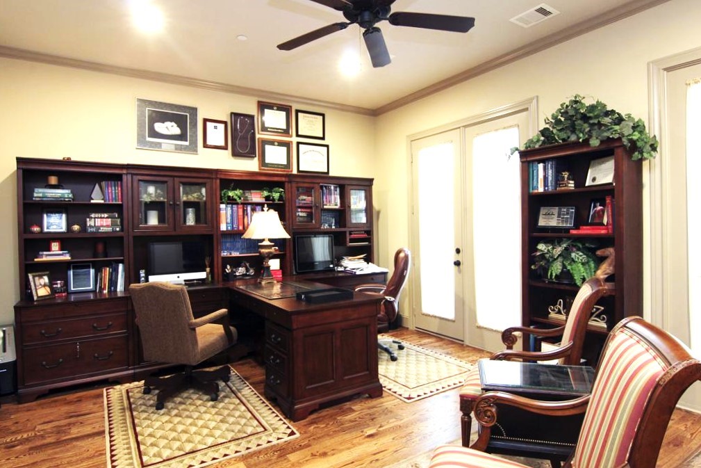1307 Rosedale Street Houston, TX 77004 - Photo 8 of 32 a work room with furniture and book shelf