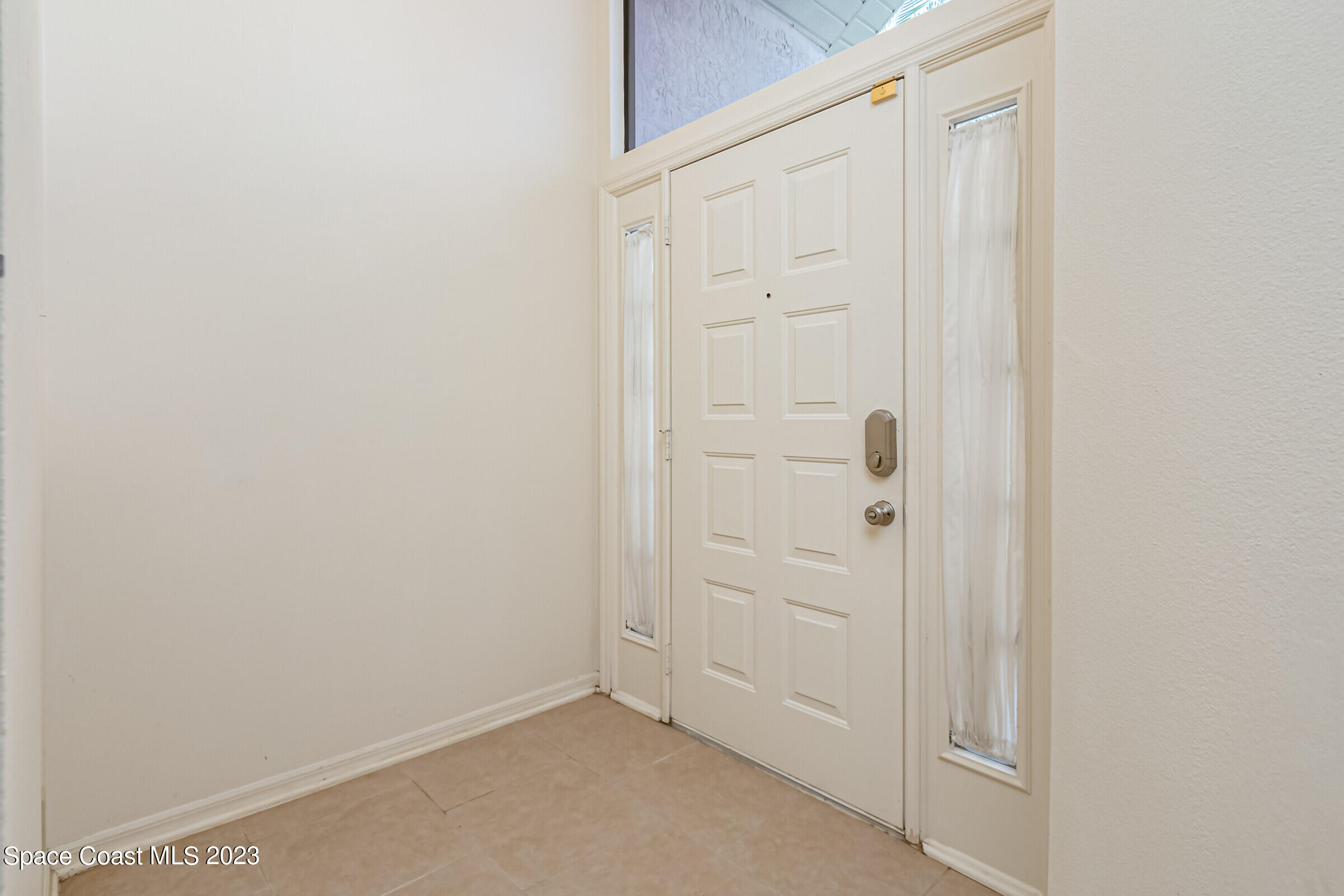 2332 Skywind Circle Melbourne, FL 32935 - Photo 21 of 34 a view of an empty room