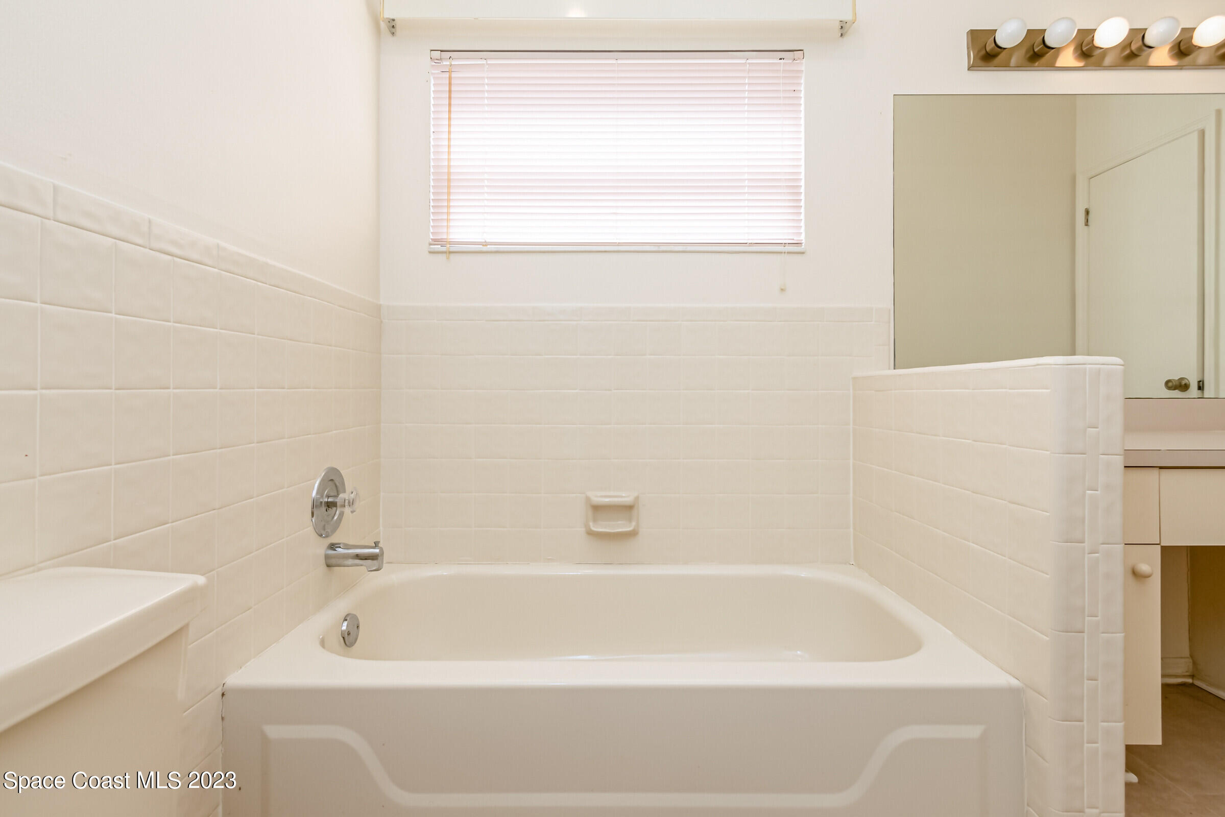 2332 Skywind Circle Melbourne, FL 32935 - Photo 28 of 34 a bathroom with a bathtub