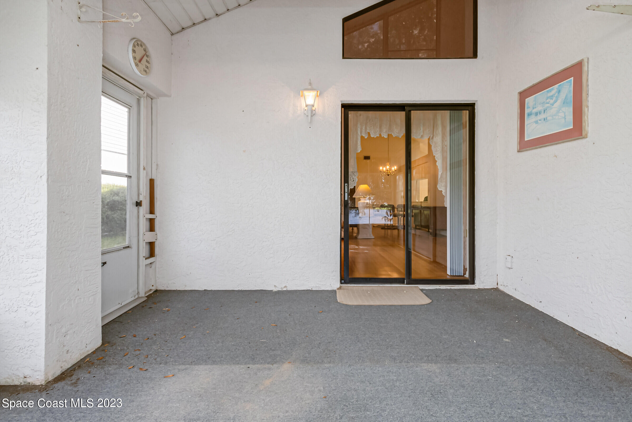 2332 Skywind Circle Melbourne, FL 32935 - Photo 30 of 34 a view of an empty room with a window