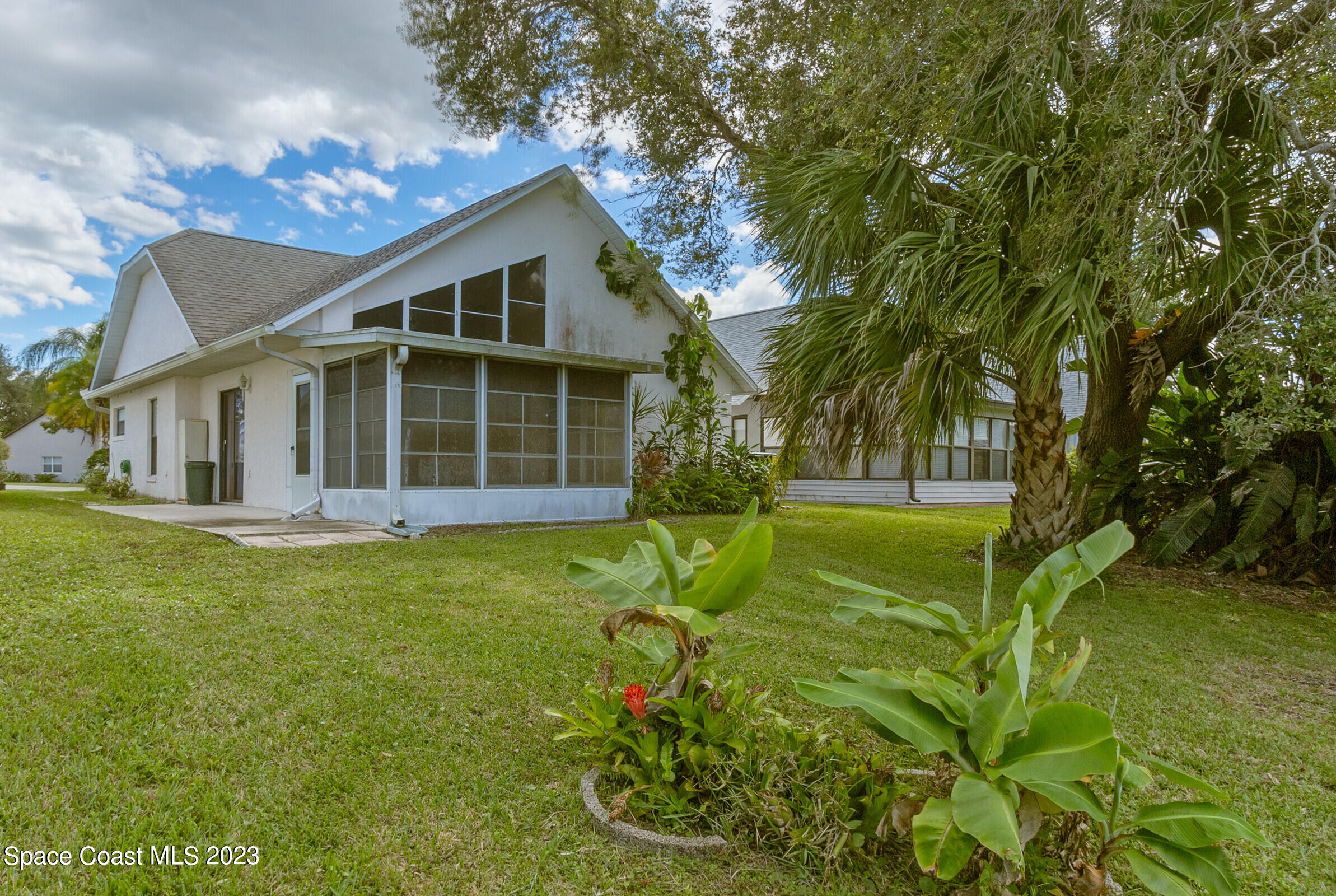2332 Skywind Circle Melbourne, FL 32935 - Photo 3 of 34 a view of a house with a backyard