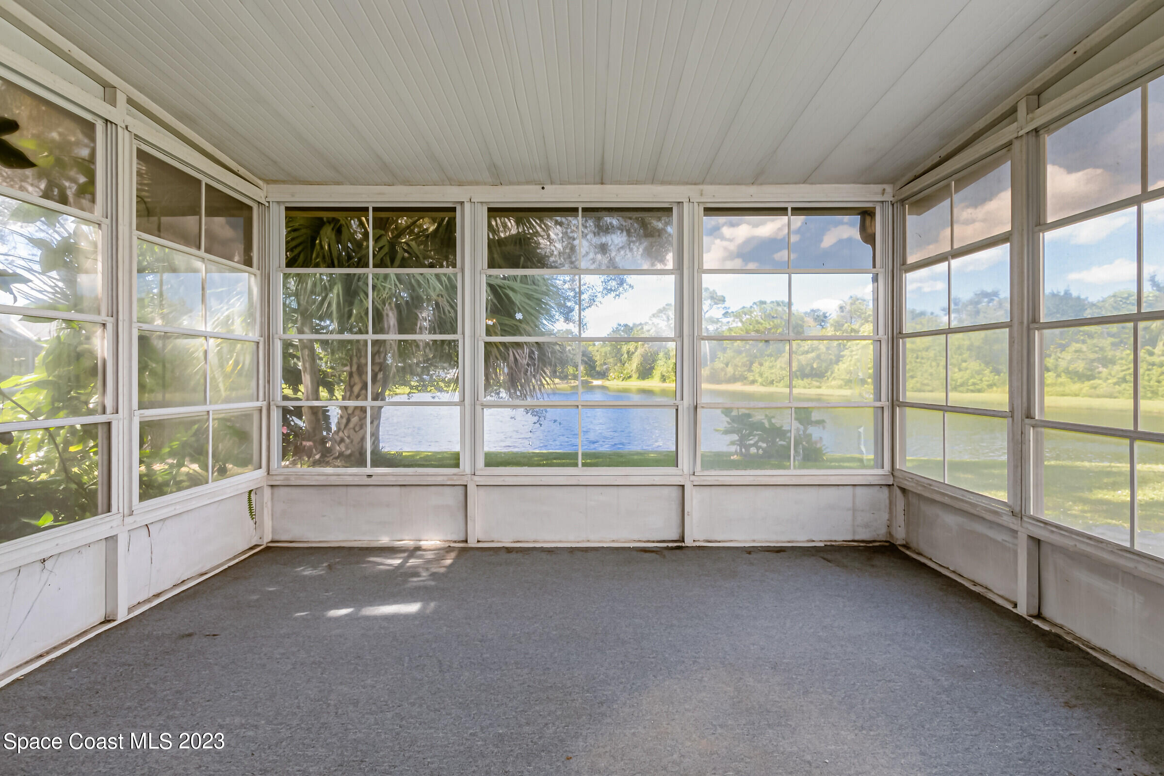 2332 Skywind Circle Melbourne, FL 32935 - Photo 31 of 34 a view of an empty room with a large window