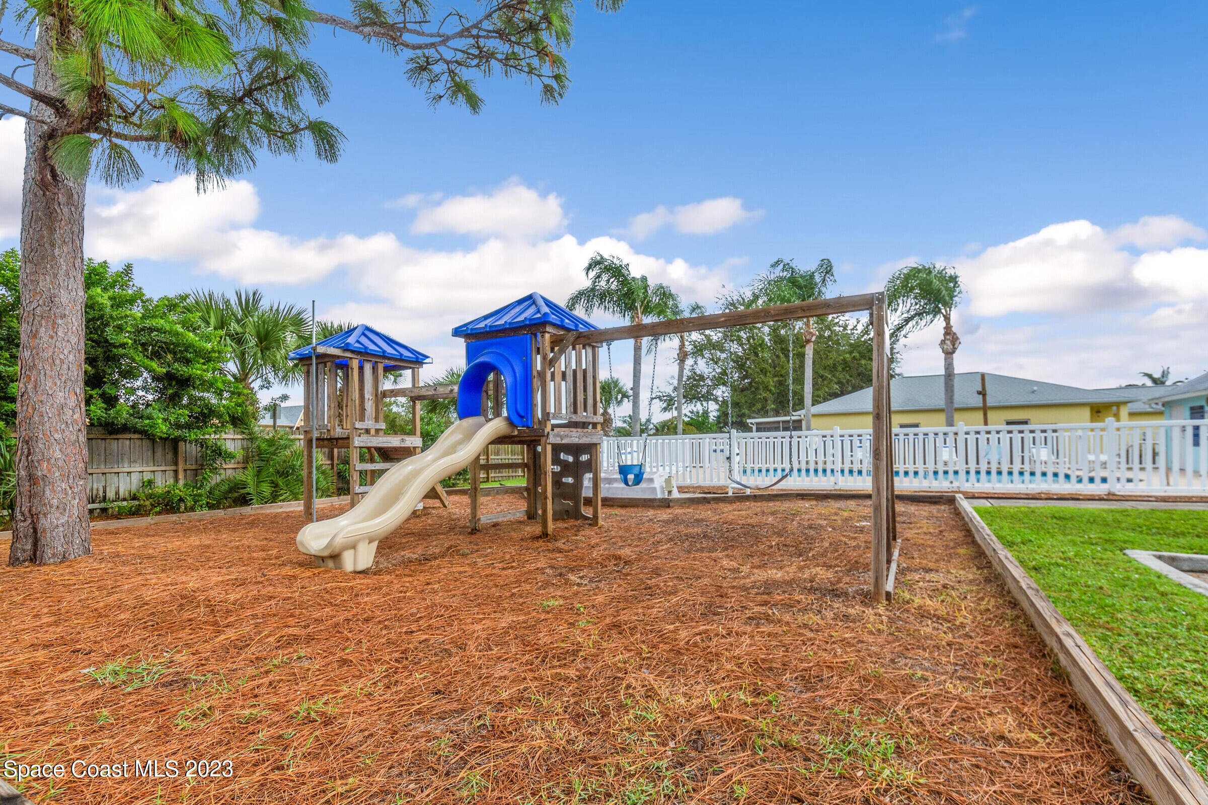 2332 Skywind Circle Melbourne, FL 32935 - Photo 34 of 34 a view of a house with a yard