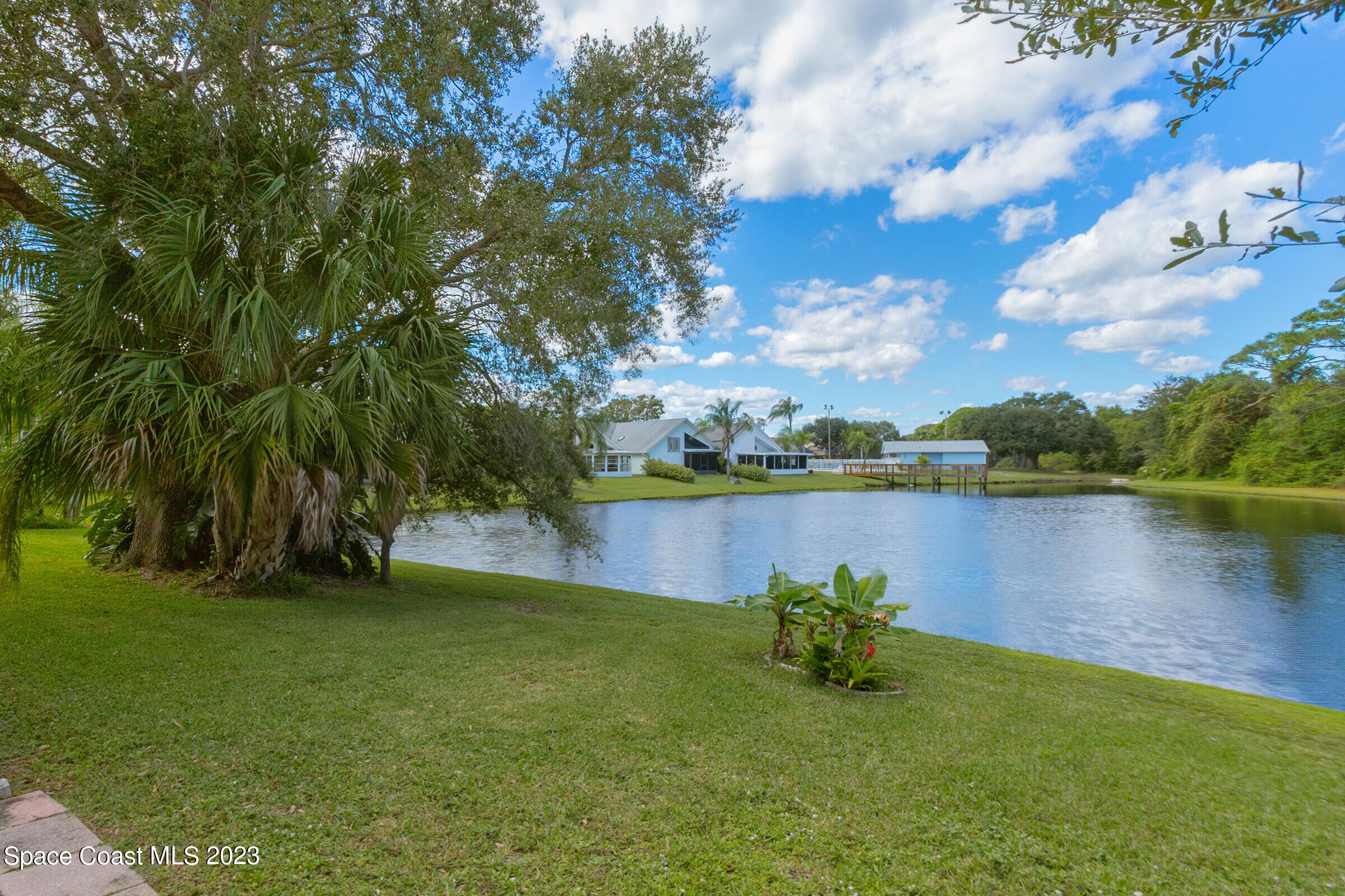 2332 Skywind Circle Melbourne, FL 32935 - Photo 5 of 34 a view of lake with green space