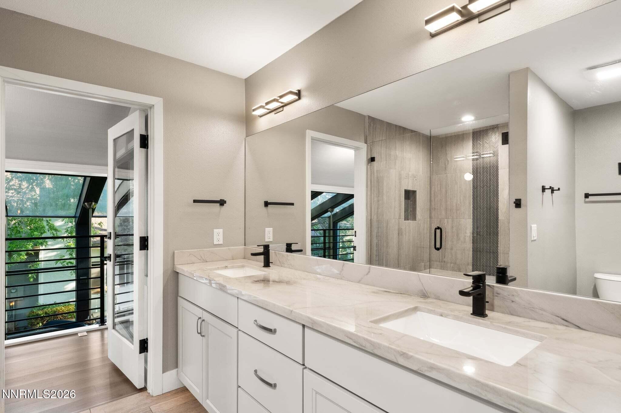430 Angela Place Reno, NV 89509 - Photo 38 of 48 a bathroom with a sink and a mirror
