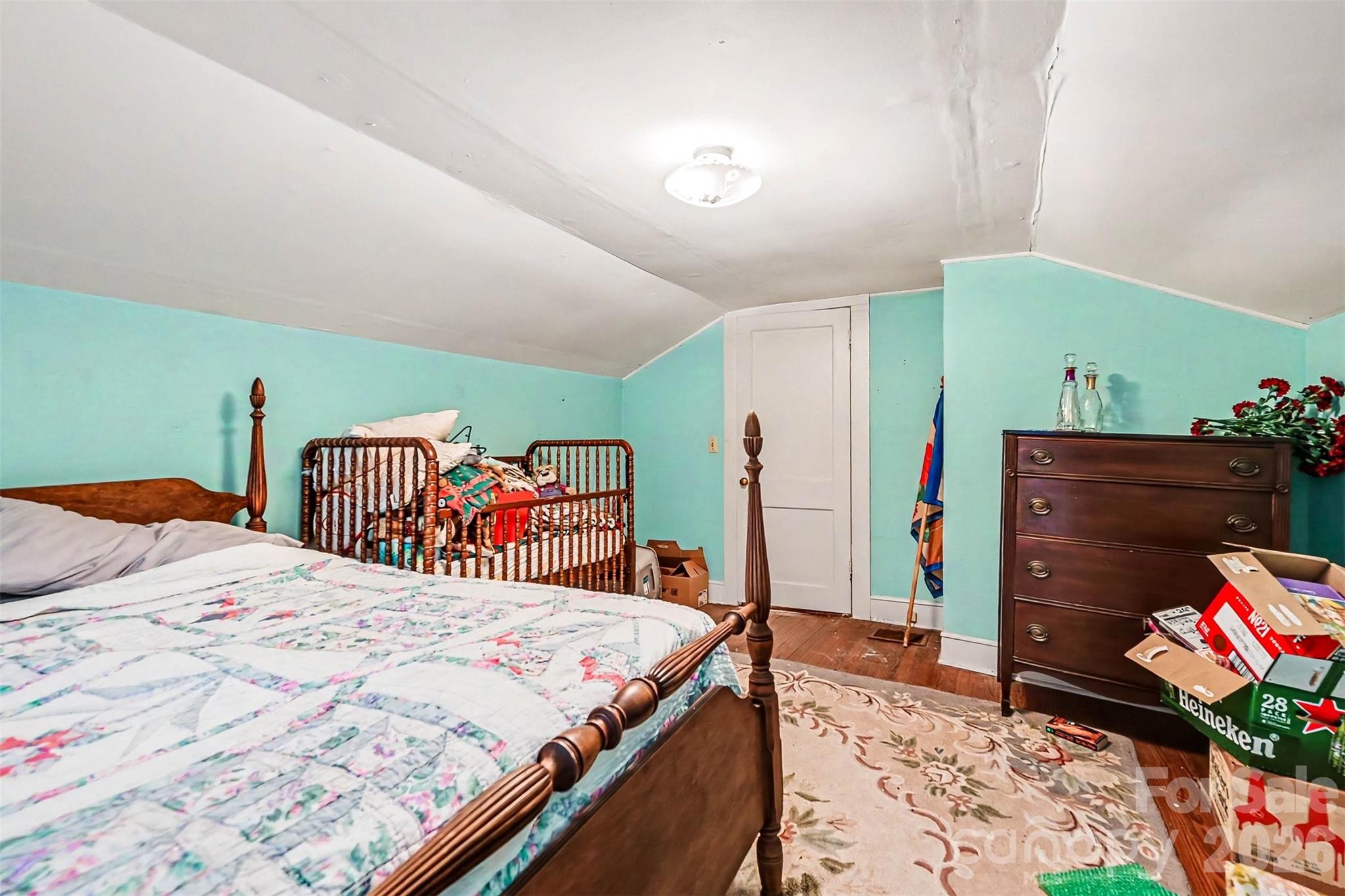 1116 Medlin Road Monroe, NC 28112 - Photo 26 of 40 a bedroom with a bed and a dresser