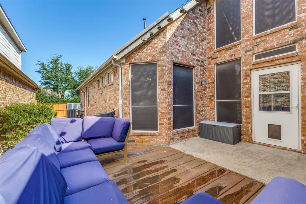 1046 Gold Camp Road Frisco, TX 75033 - Photo 19 of 25 a wooden bench sitting in front of a building