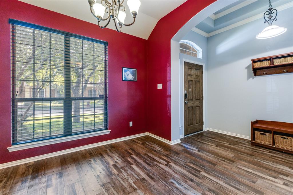 1046 Gold Camp Road Frisco, TX 75033 - Photo 3 of 25 a view of empty room with wooden floor and fan