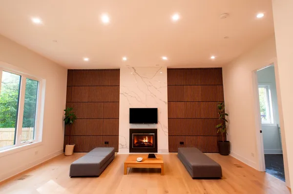 a living room with furniture and a fireplace