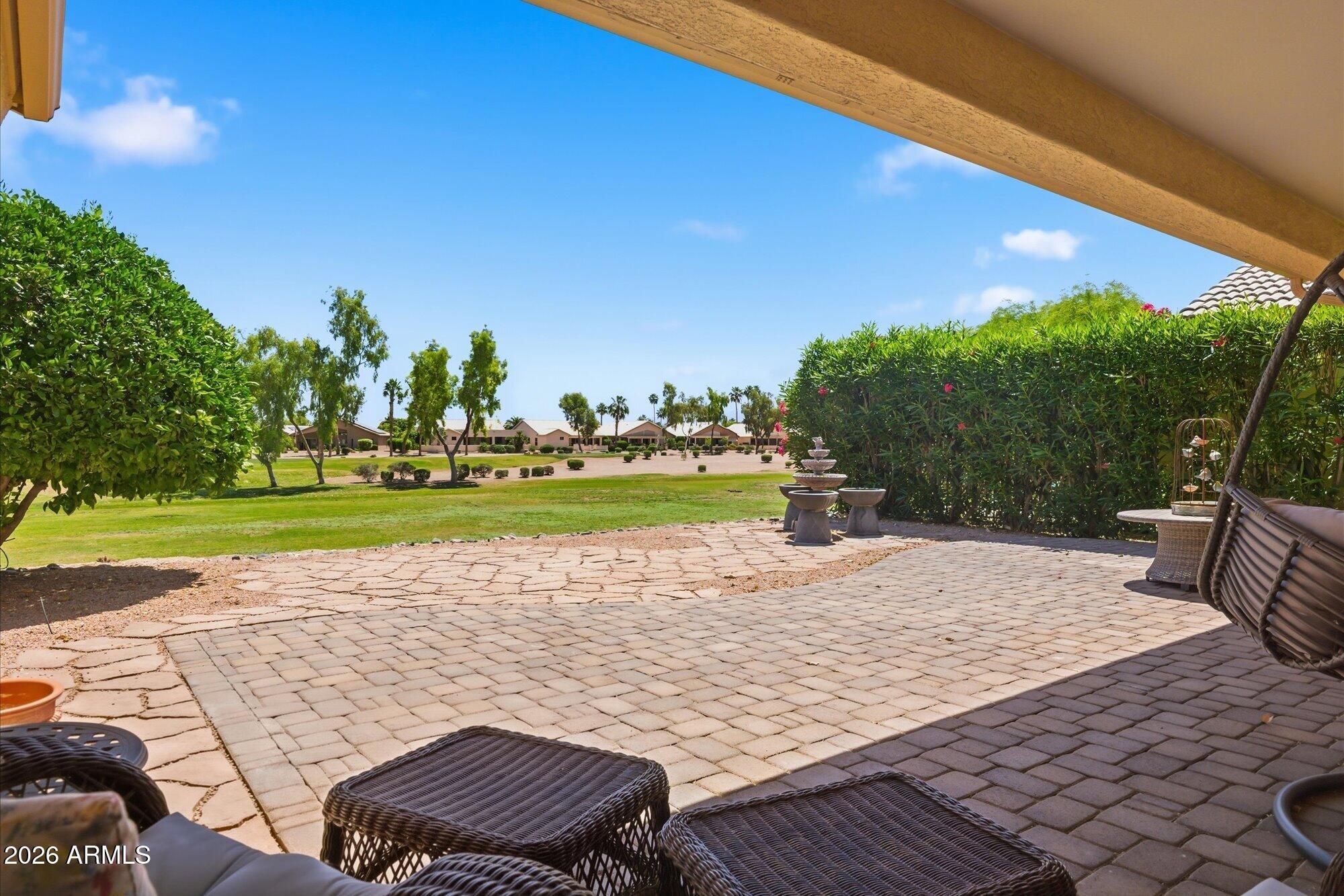 3895 North 150th Lane Goodyear, AZ 85395 - Photo 21 of 34 a view of a lake with a big yard