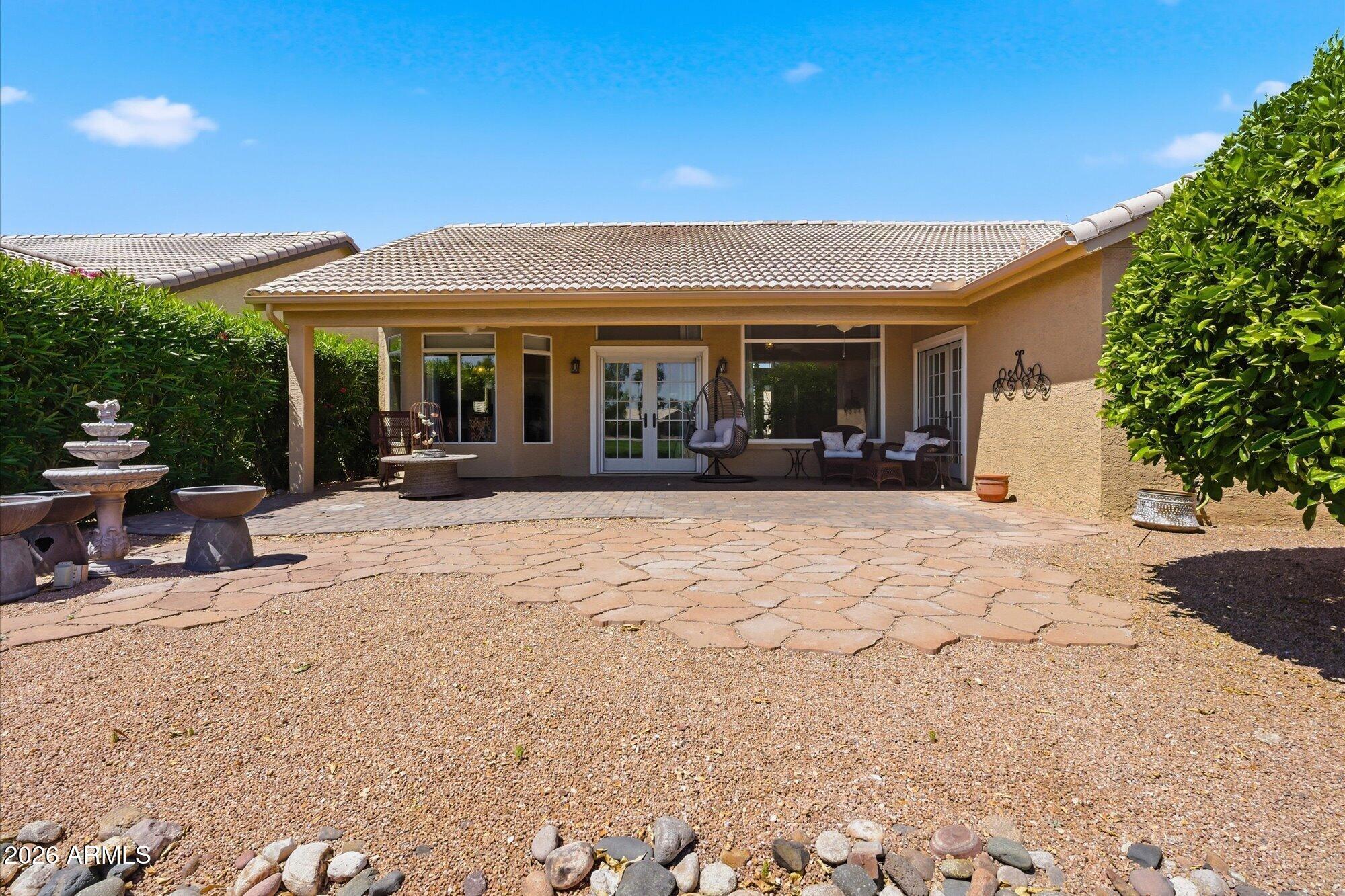3895 North 150th Lane Goodyear, AZ 85395 - Photo 25 of 34 a view of a house with patio