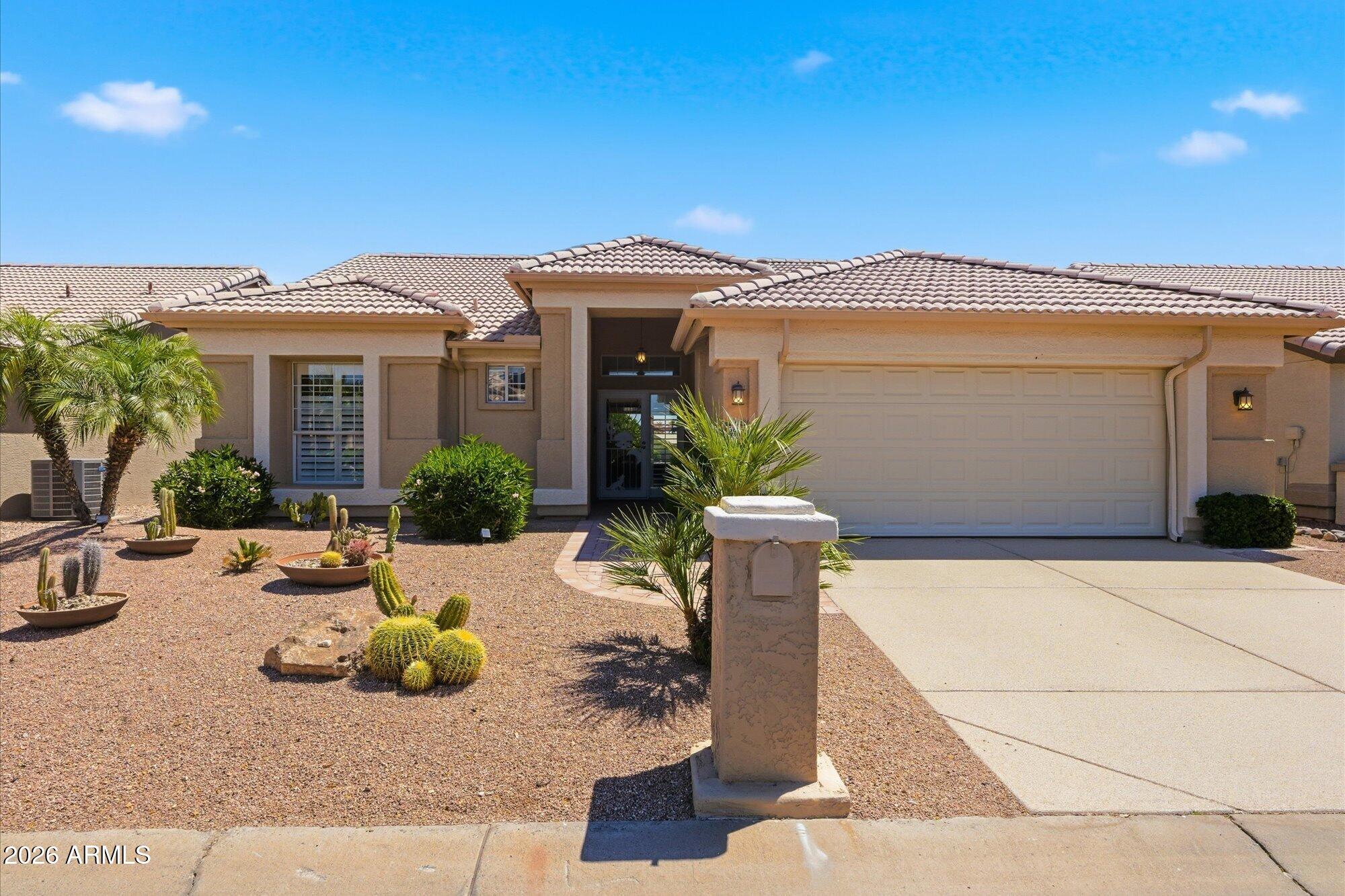 3895 North 150th Lane Goodyear, AZ 85395 - Photo 30 of 34 a view of a house with patio