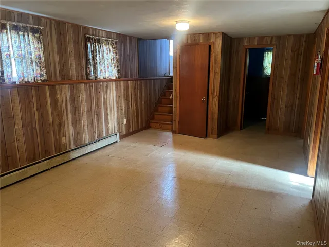 a view of a room that has a fireplace in it