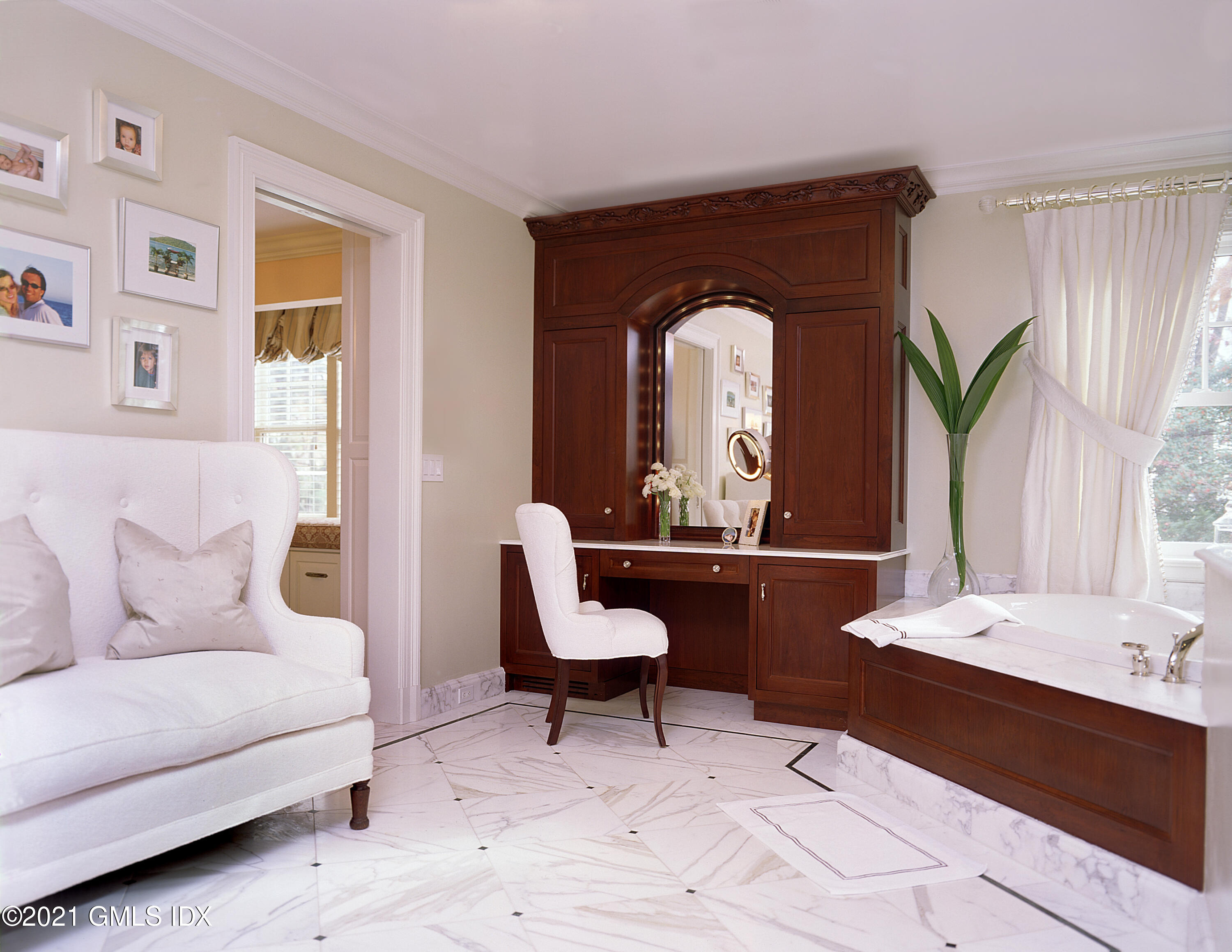 200 Byram Shore Road Greenwich, CT 06830 - Photo 19 of 27 a living room with furniture and a large window