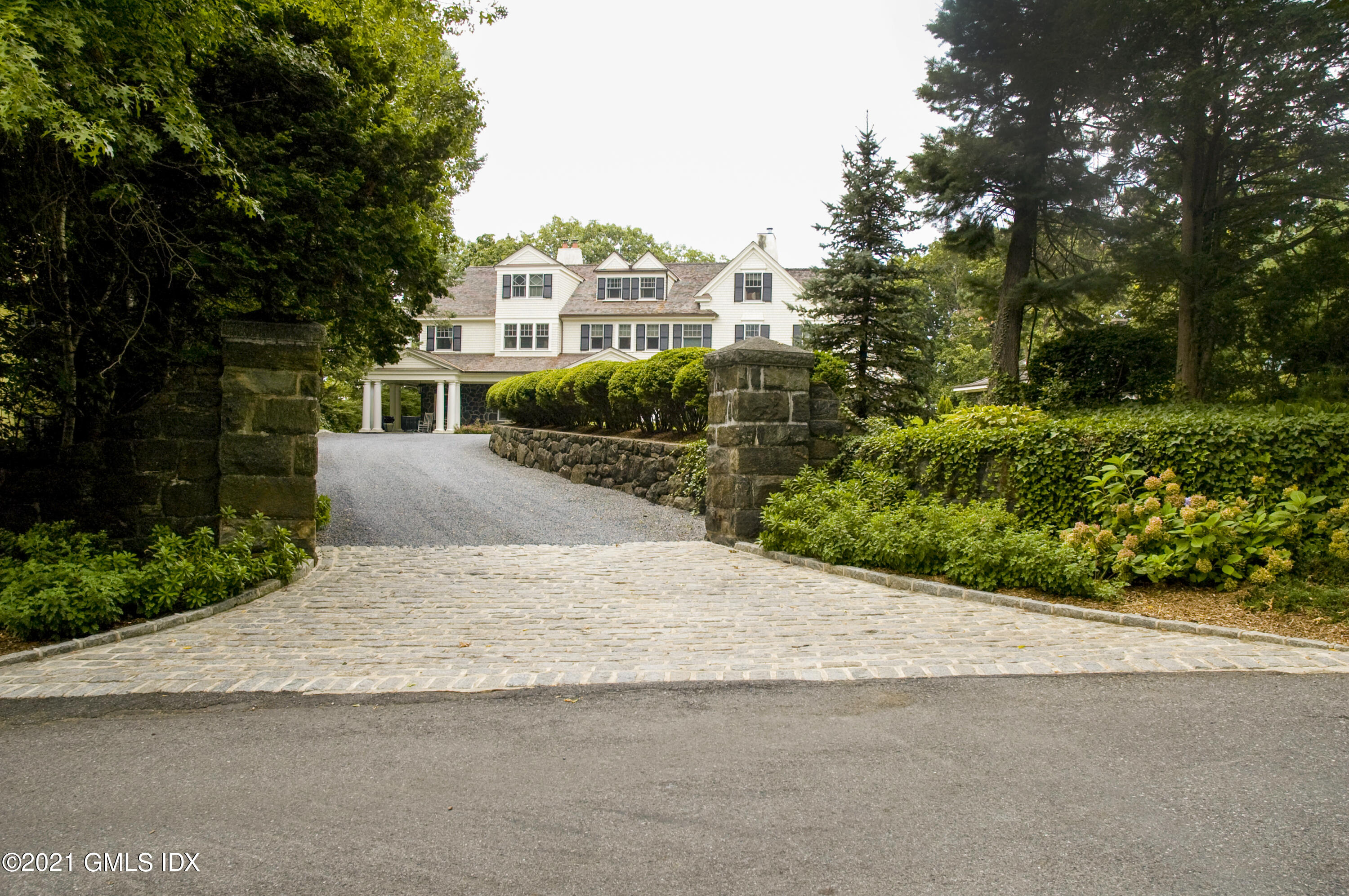 200 Byram Shore Road Greenwich, CT 06830 - Photo 2 of 27 a view of multiple house with a street