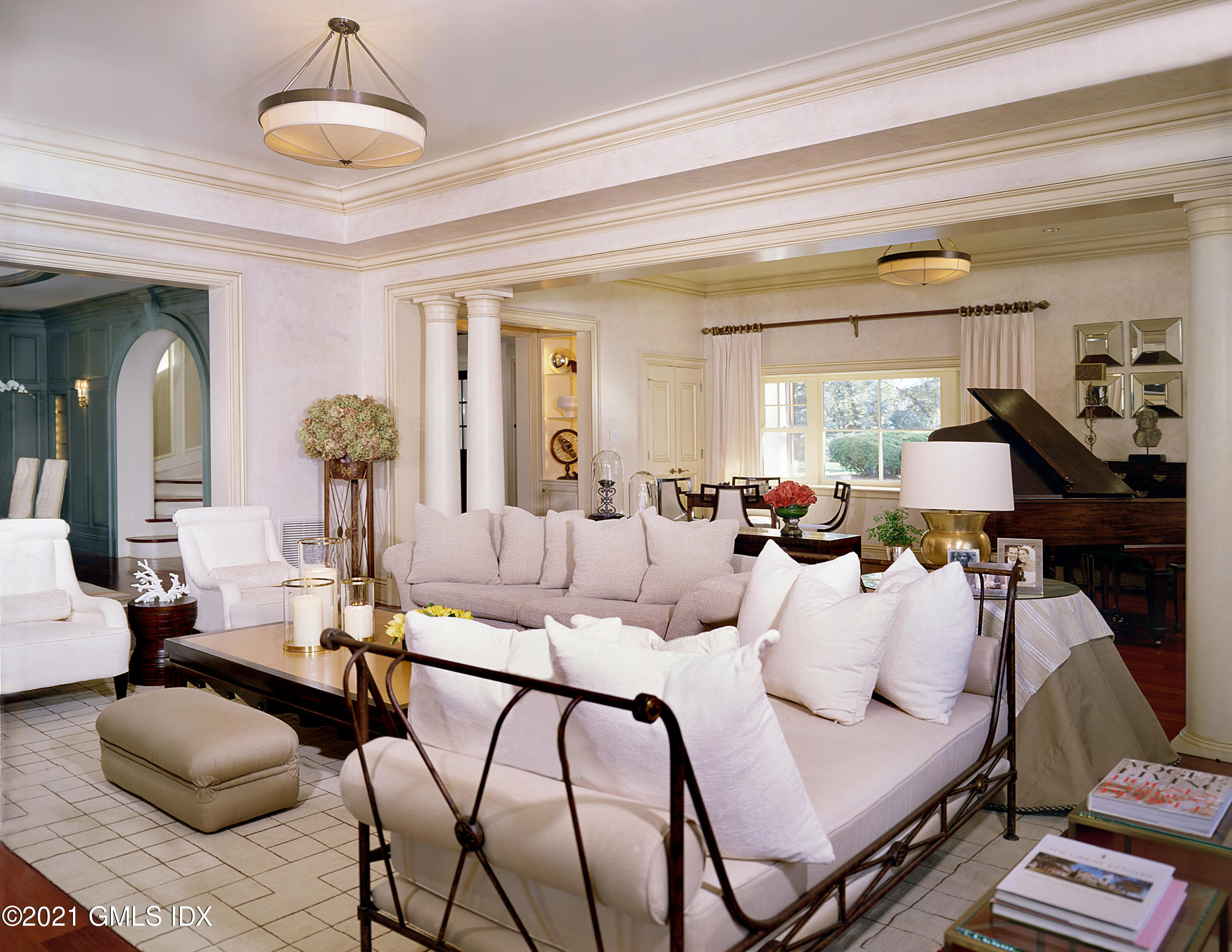 200 Byram Shore Road Greenwich, CT 06830 - Photo 5 of 27 a living room with furniture and a chandelier