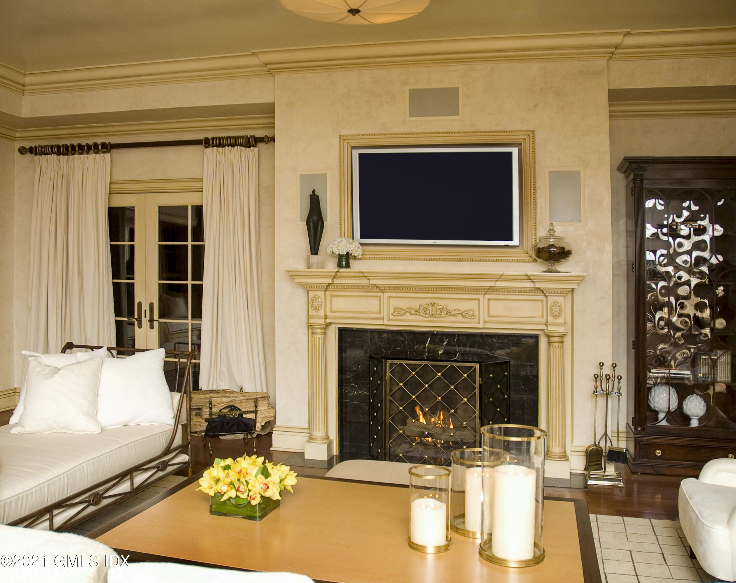 200 Byram Shore Road Greenwich, CT 06830 - Photo 8 of 27 a living room with furniture and a fireplace