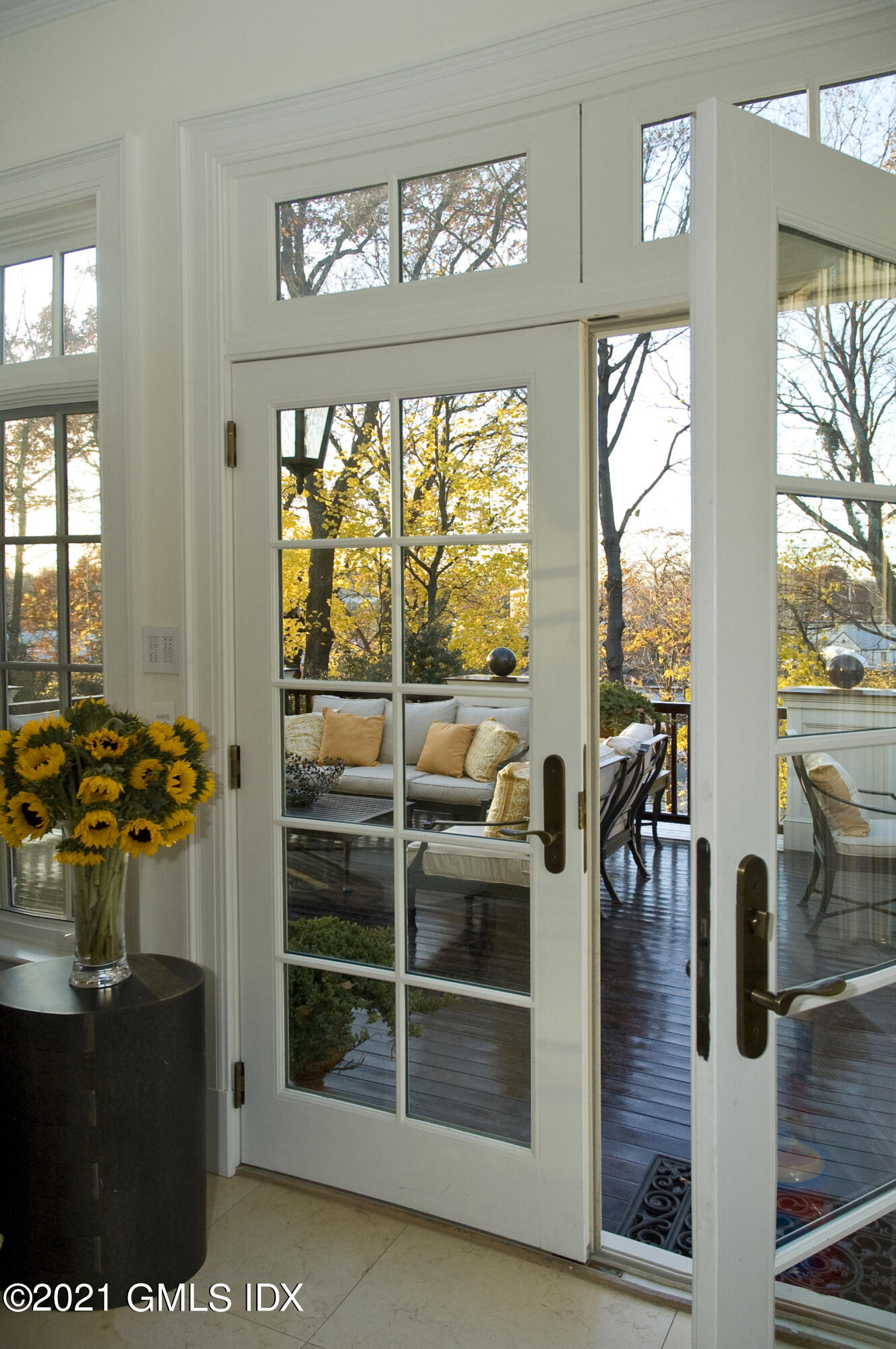 200 Byram Shore Road Greenwich, CT 06830 - Photo 10 of 27 a view of living room with furniture and floor to ceiling window