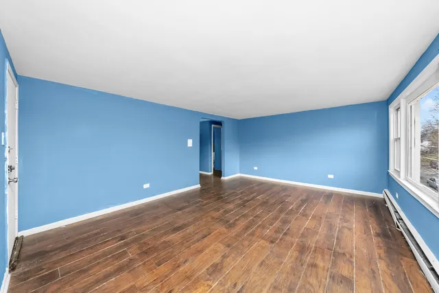 a view of an empty room and window