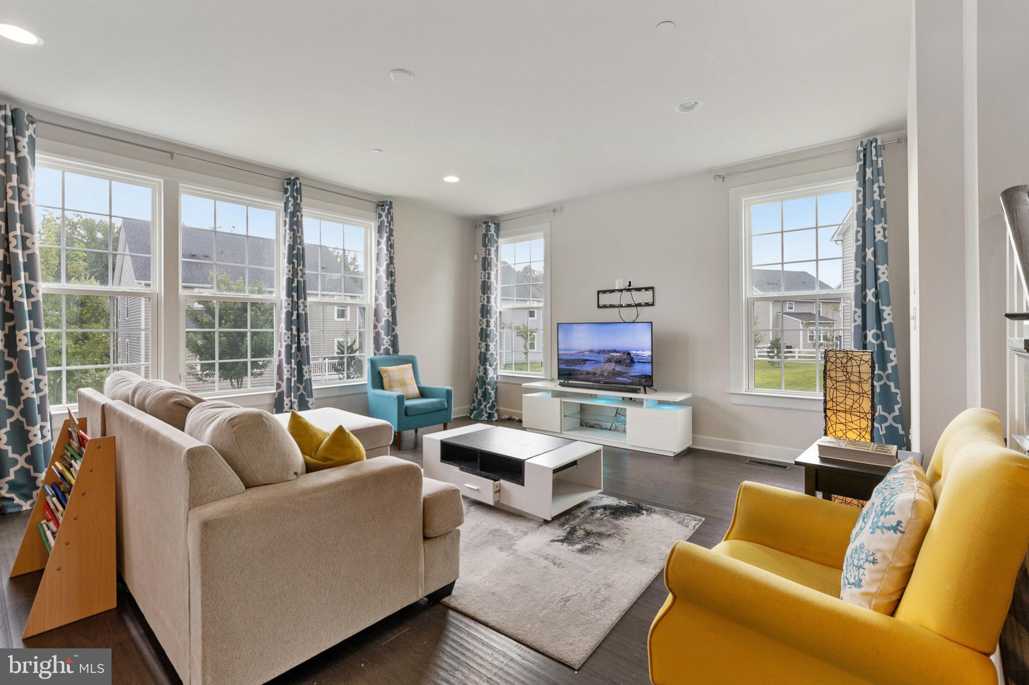 4300 Open Field Court Bowie, MD 20720 - Photo 12 of 53 a living room with furniture and a large window