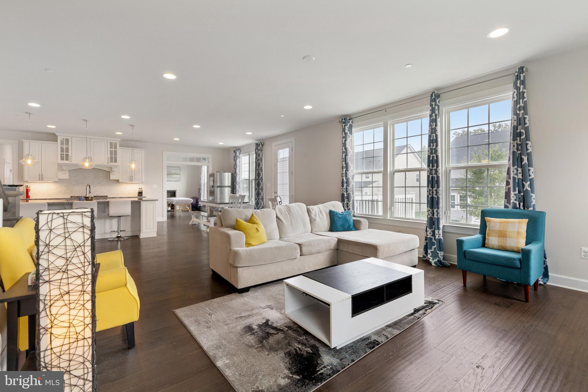 4300 Open Field Court Bowie, MD 20720 - Photo 13 of 53 a living room with furniture and a large window